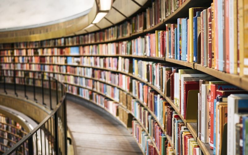 Stack of colorful books on a table