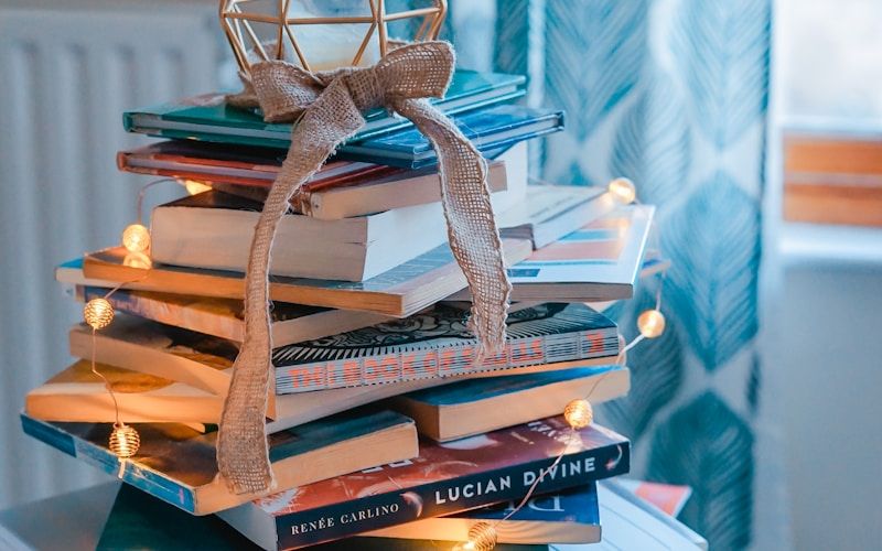 Person reading a book in warm light